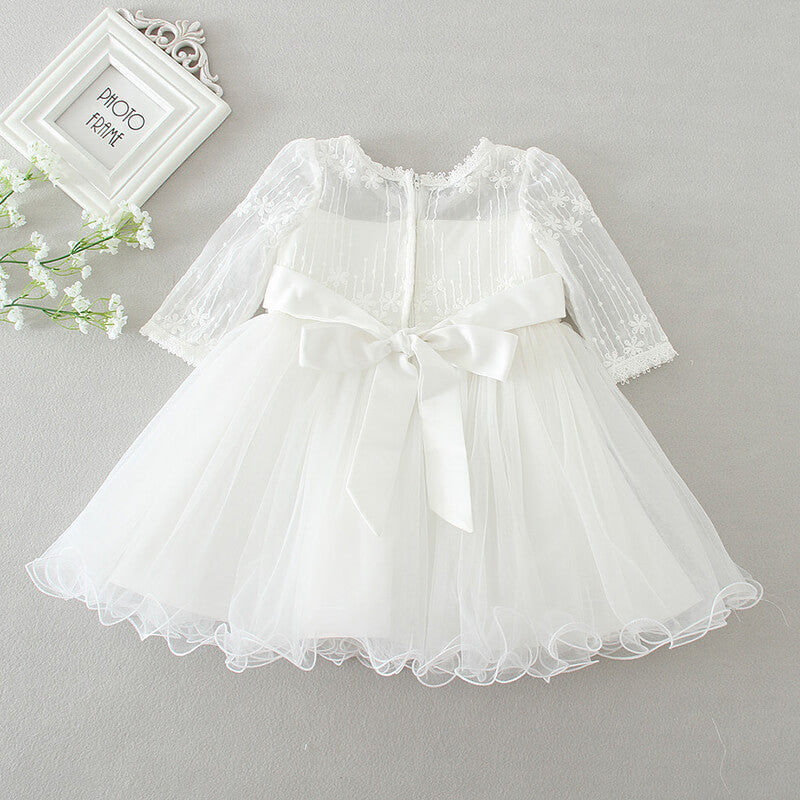 Elegant & charming Clara girls' polka dot dress. Versatile for special occasions, parties, and flower girl roles.