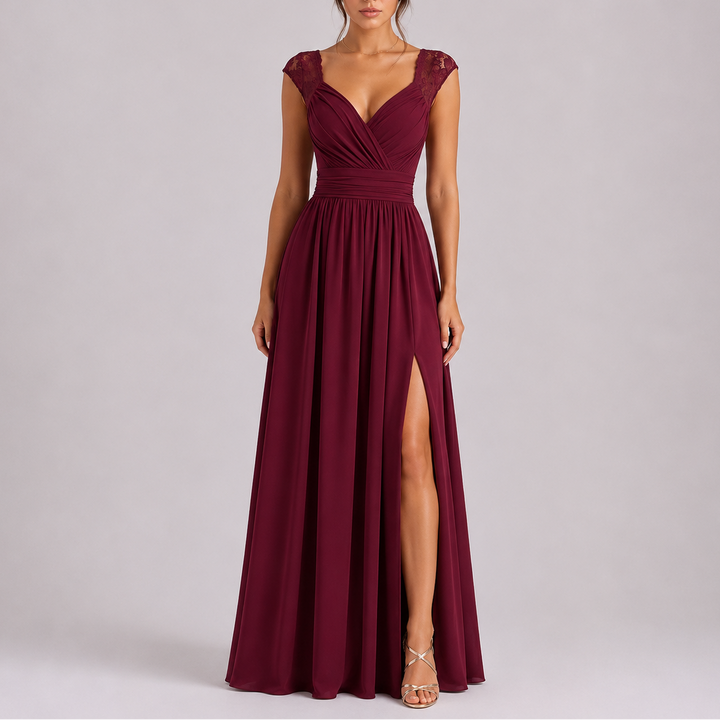 Women's elegant black maxi dress with a sophisticated styled shoulder and a graceful leg slit, formal wear.