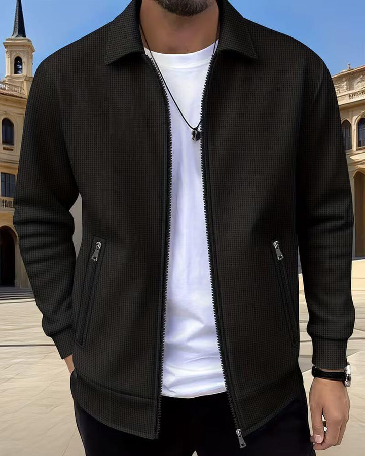 Man wearing lightweight men's textured athletic jacket, active lifestyle, versatile for everyday use.