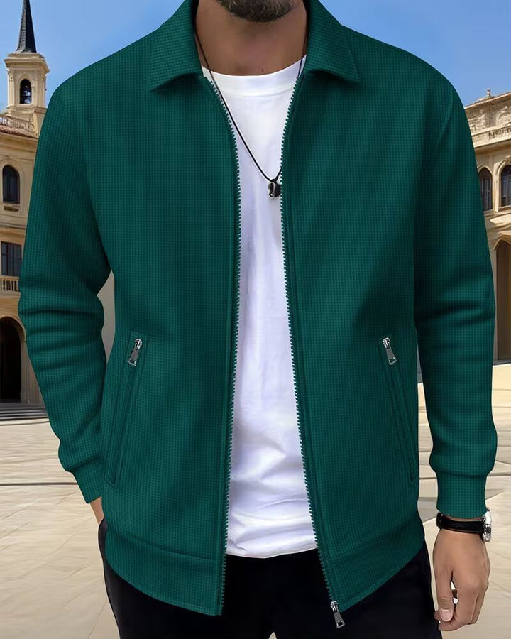 Detail of men's casual textured athletic jacket, high collar & sturdy zipper for comfort & style.