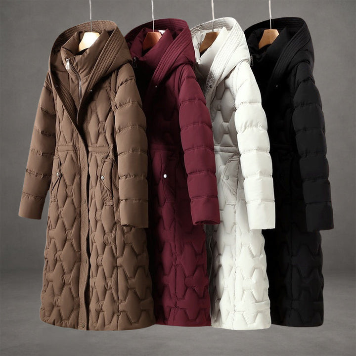Elegant women's quilted maxi puffer coat with hood, perfect for stylish winter warmth.