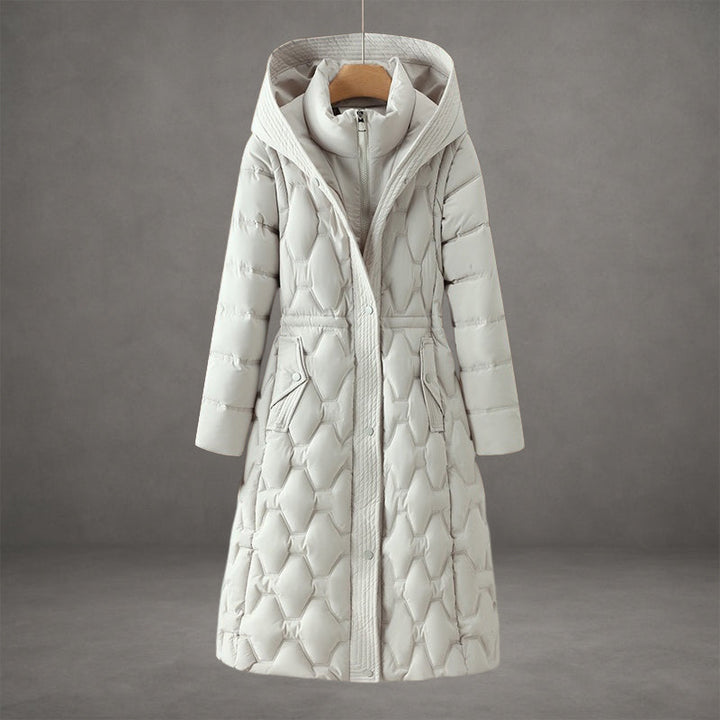 Women's long quilted winter coat, a stylish and warm puffer jacket with a practical hood.