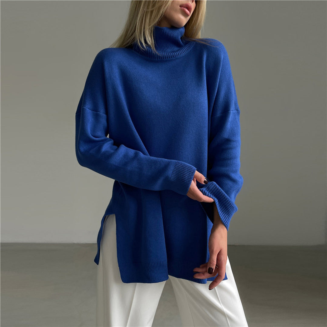 Stay warm in this women's relaxed turtleneck sweater with side split, a versatile and elegant fall/winter top.