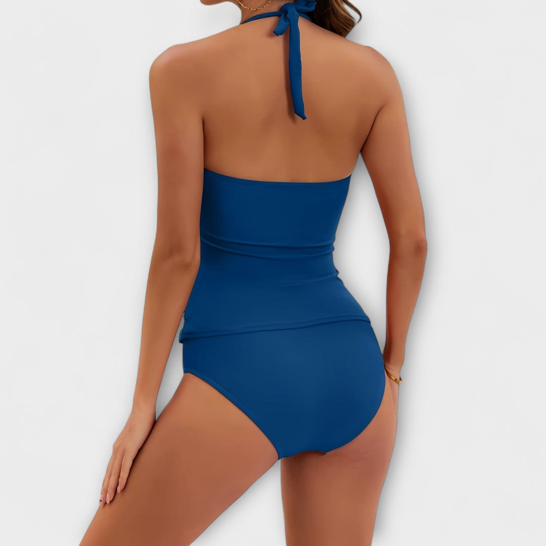 Comfortable solid halter two-piece swimsuit for women. Flattering swimwear for summer resort trips.
