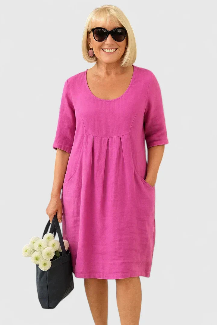 Comfortable half-sleeve midi dress for women, with pockets. Versatile casual & elegant everyday wear.