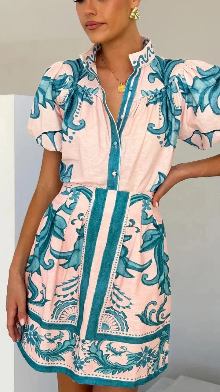 Flattering women's floral puff sleeve mini dress, designed for elegance and comfort.