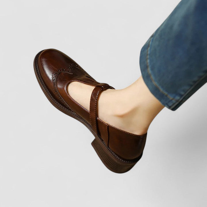 Classic women's Mary Jane shoes, comfortable round toe flats with an instep strap.