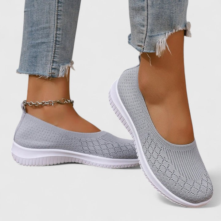 Women's supportive slip-on orthopaedic shoes, designed for comfort, wide fit, and arch support.