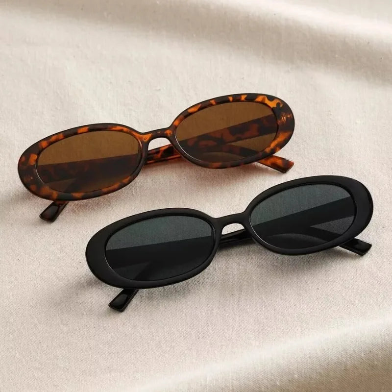 Black women's retro vintage sunglasses, offering classic style & essential UV protection.