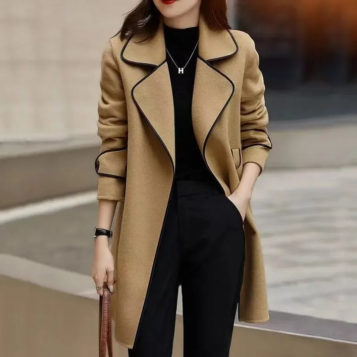 Women's tailored longline trench coat, classic style, perfect outerwear for fall and winter fashion.