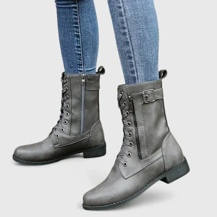 Fashionable women's ankle boots with orthopedic arch support, ensuring comfortable & stylish steps.