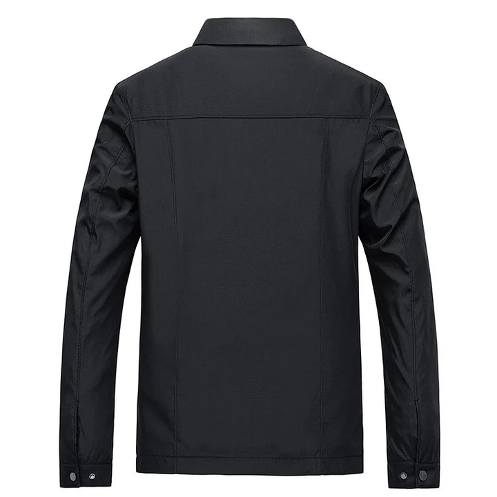 Fashionable men's transitional outerwear, a zip-up casual jacket with point collar & plaid lining.