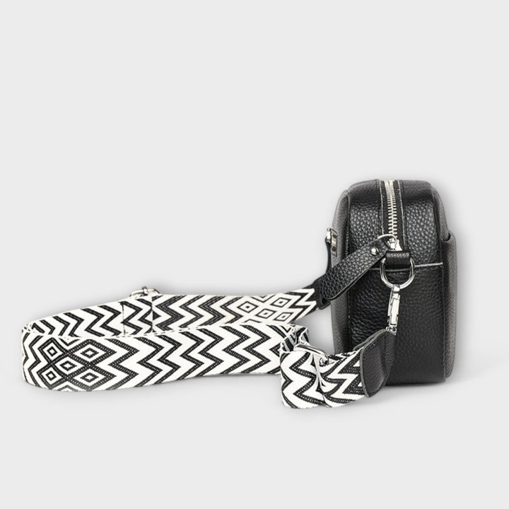 Fashionable elegant mini shoulder bag, ideal for women's daily carry. Chic small crossbody handbag accessory.