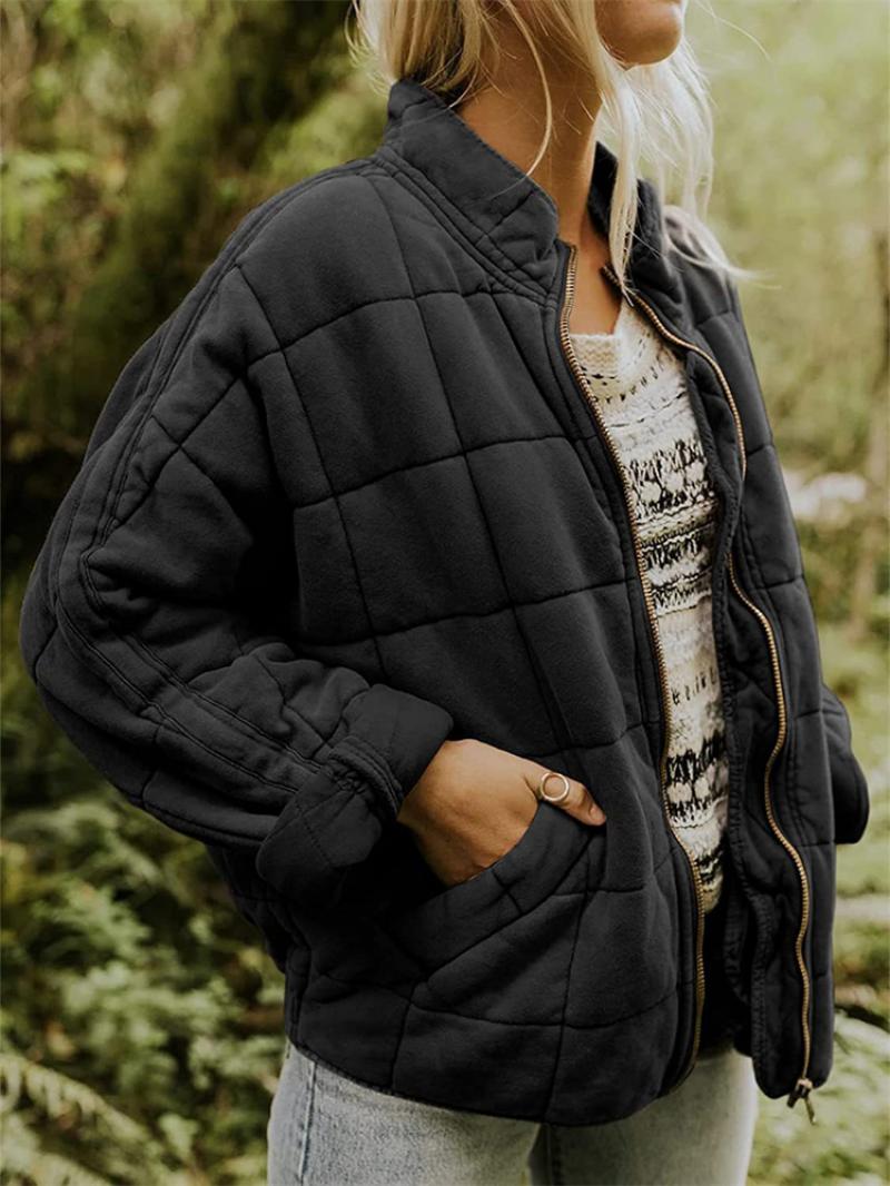 Everyday women's quilted jacket with a functional zipper, offering comfort and style for versatile casual wear.