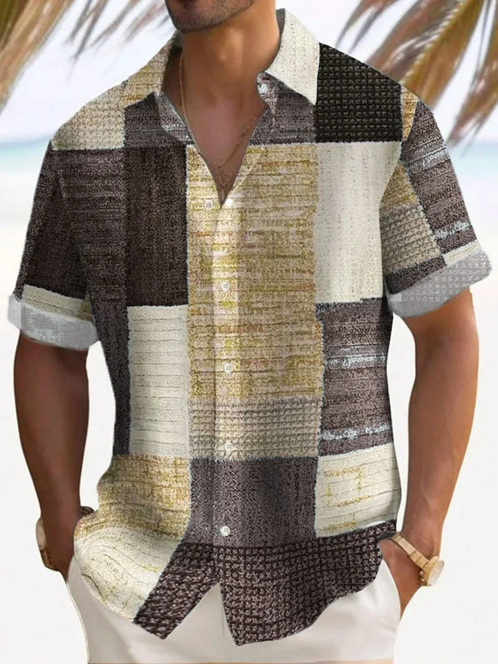 Casual men's vintage patchwork short sleeve shirt, relaxed fit. Colorful button-up for summer vacation.