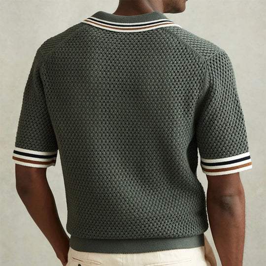 Fashionable men's short sleeve polo, perfect summer wear. Stylish button-front casual shirt offering comfort & versatility.