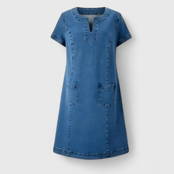 Soft, breathable women's blue casual dress with practical pockets. Enjoy a flowy, comfortable fit for any occasion.