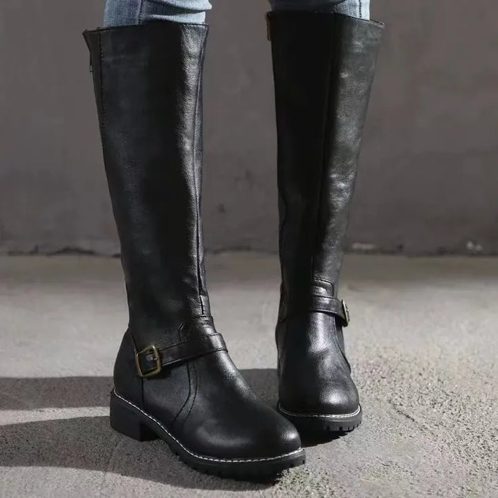 Elegant tall buckle boots for women, featuring orthopedic support. Stylish & comfortable for winter fashion.