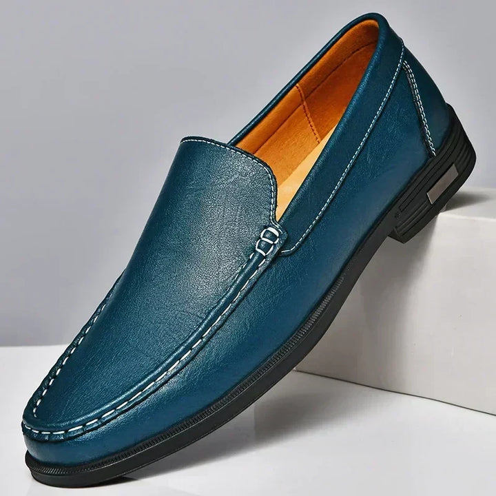 Men's timeless slip-on loafers with elegant design. Versatile for dress shoes and smart casual men's fashion.