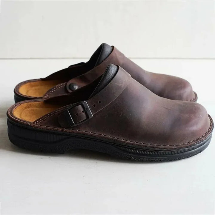 Men's premium brown leather slip-on shoes for easy everyday comfort and versatile casual style.