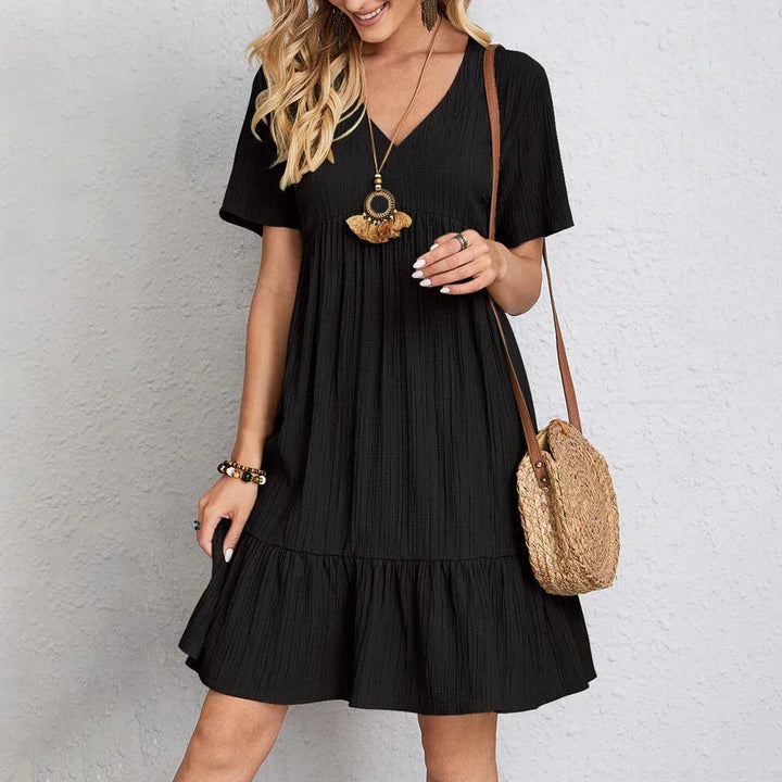 Chic women's A-line midi dress with a flattering tie waist, offering an elegant and versatile look.