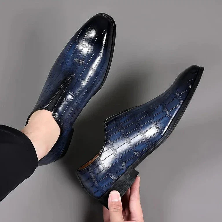 Men's glossy black crocodile pattern slip-on brogues, durable and stylish formal shoes for discerning gentlemen.