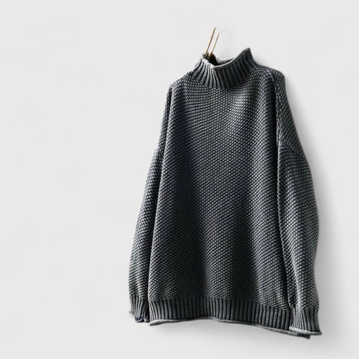 Detail of the mock neck on a women's textured knit long sleeve sweater, perfect for cozy winter style.