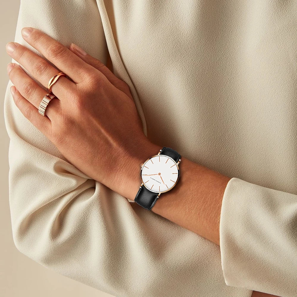 Classic women's daily wear watch, round dial, premium leather strap, minimalist and timeless.
