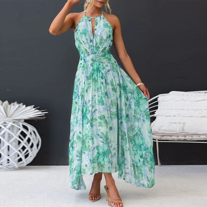 Vibrant boho floral halterneck maxi dress for women. Flowy summer beachwear & elegant party guest attire.