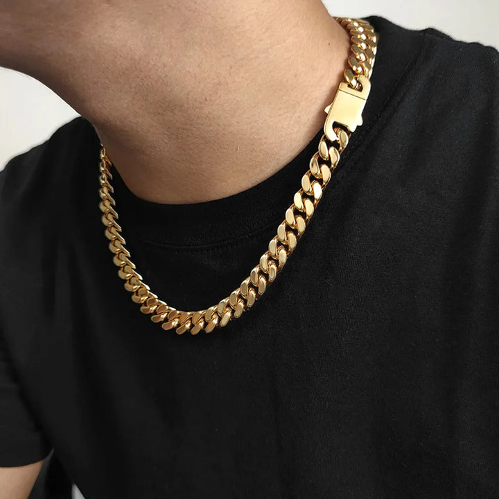 Fashionable men's Cuban link necklace, gold & silver plated stainless steel for a bold statement.