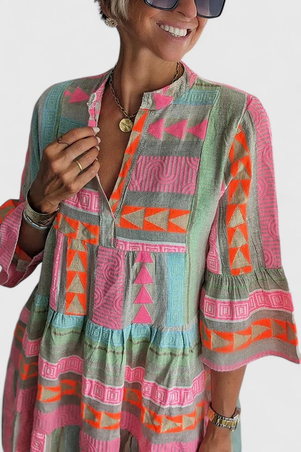 Women's comfortable boho tiered swing dress in a vibrant multi-colored bohemian style, perfect for summer.