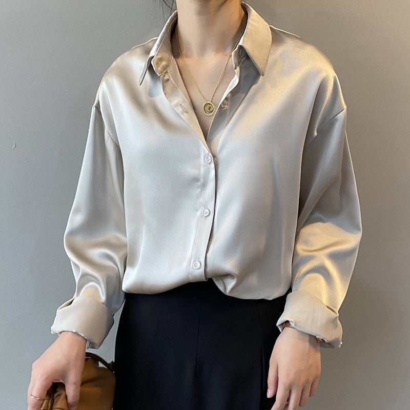 Vintage-inspired women's long sleeve blouse, an elegant and chic top for sophisticated fashion.