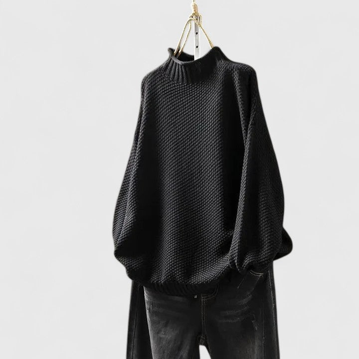 Classic black women's textured mock neck jumper, a cozy long sleeve sweater for elegant winter style.