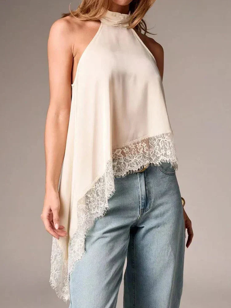 Chic sleeveless women's blouse featuring a stylish halter neckline and delicate asymmetric lace trim.