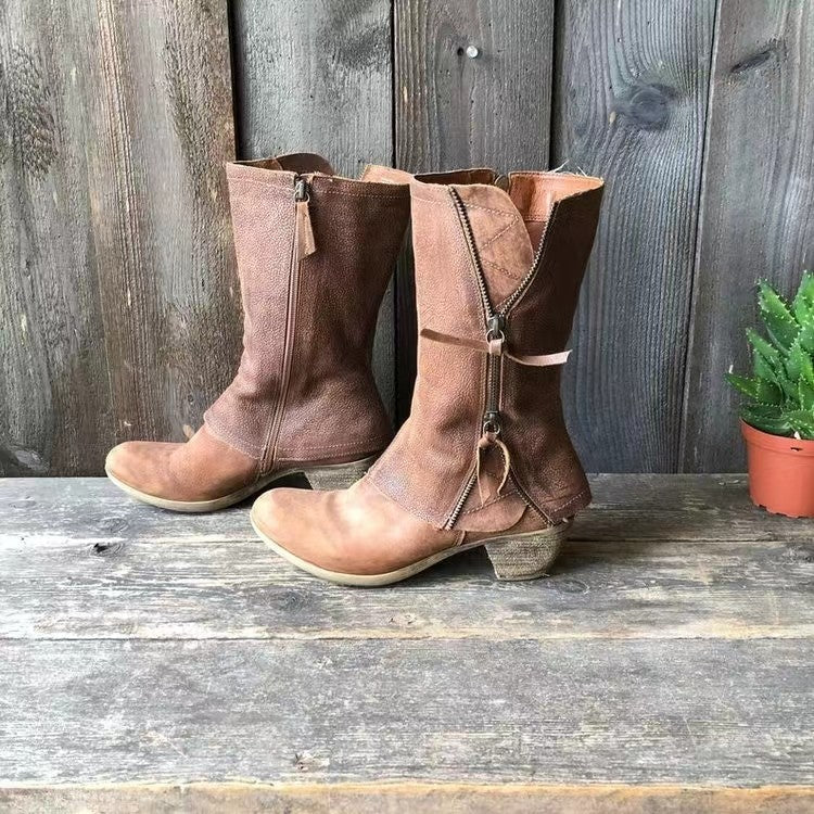 Versatile elegant brown women's mid-calf boots with a sleek side zip. Ideal chic footwear for fall and winter style.