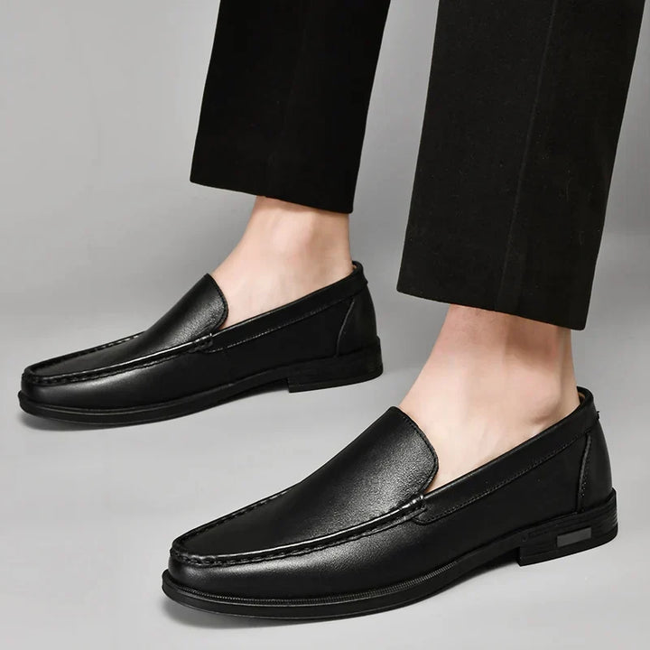 Versatile brown men's slip-on loafers, blending formal and casual fashion effortlessly.