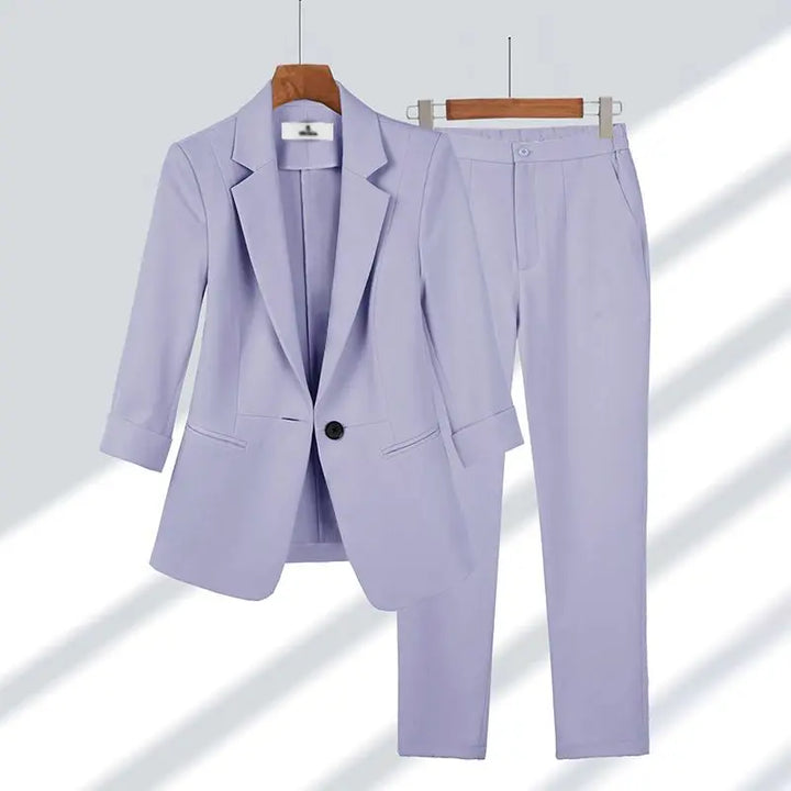 Women's formal wear: a stylish pair of tailored trousers from an elegant two-piece business suit set.