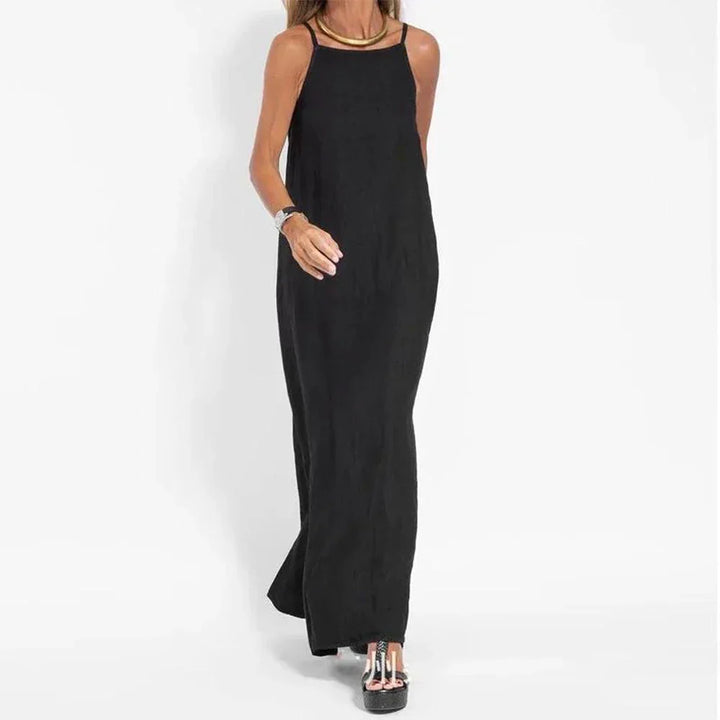 Flowy sleeveless maxi slip dress for women, ideal for summer fashion, beach vacations & elegant casual wear.