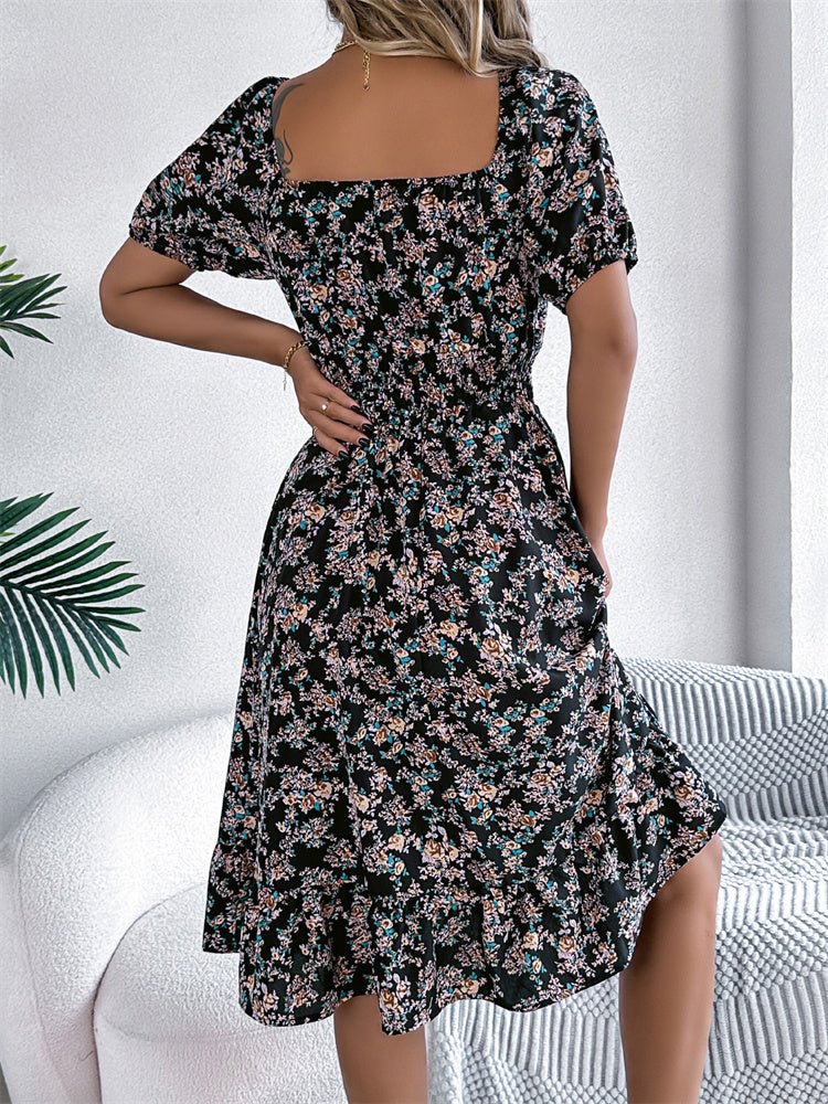 Stylish floral smocked midi dress for women with graceful puff sleeves. Casual or elegant wear.