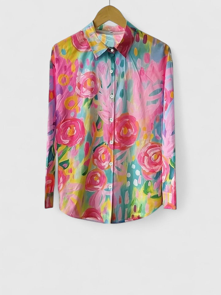 Elegant women's floral print blouse. Perfect for a chic spring outfit or comfortable everyday summer style.