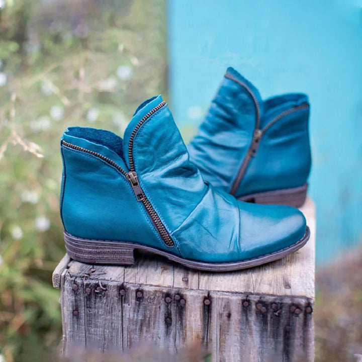 Orthopedic women's ankle boots with arch support for comfortable everyday wear.