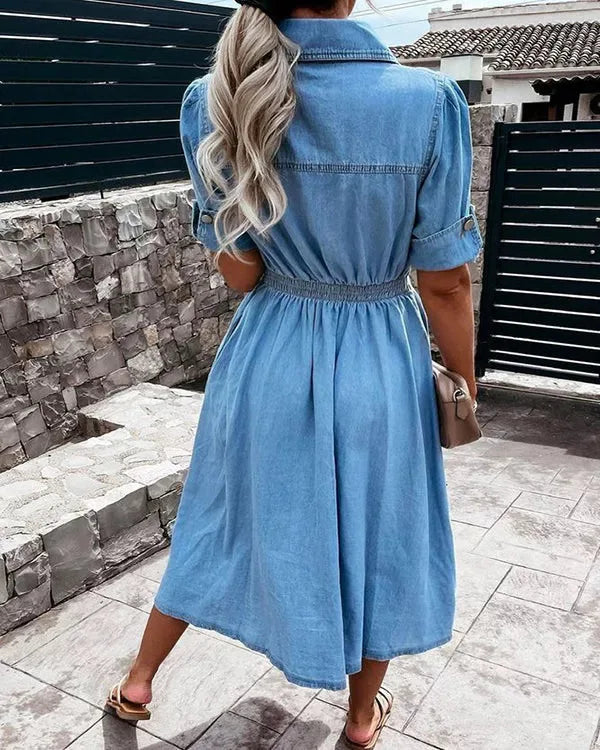 Stylish women's blue denim midi dress. Versatile button-down for casual everyday fashion, comfortable & modern outfit.