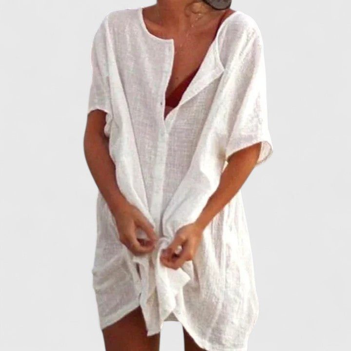 Elegant women's tunic dress for summer chic, perfect for casual or dressed-up occasions. Versatile fashion.