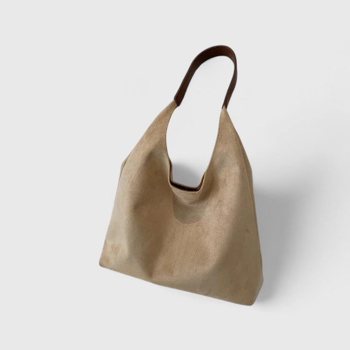 Sleek women's everyday tote bag, an essential stylish handbag with spacious compartments for daily items.