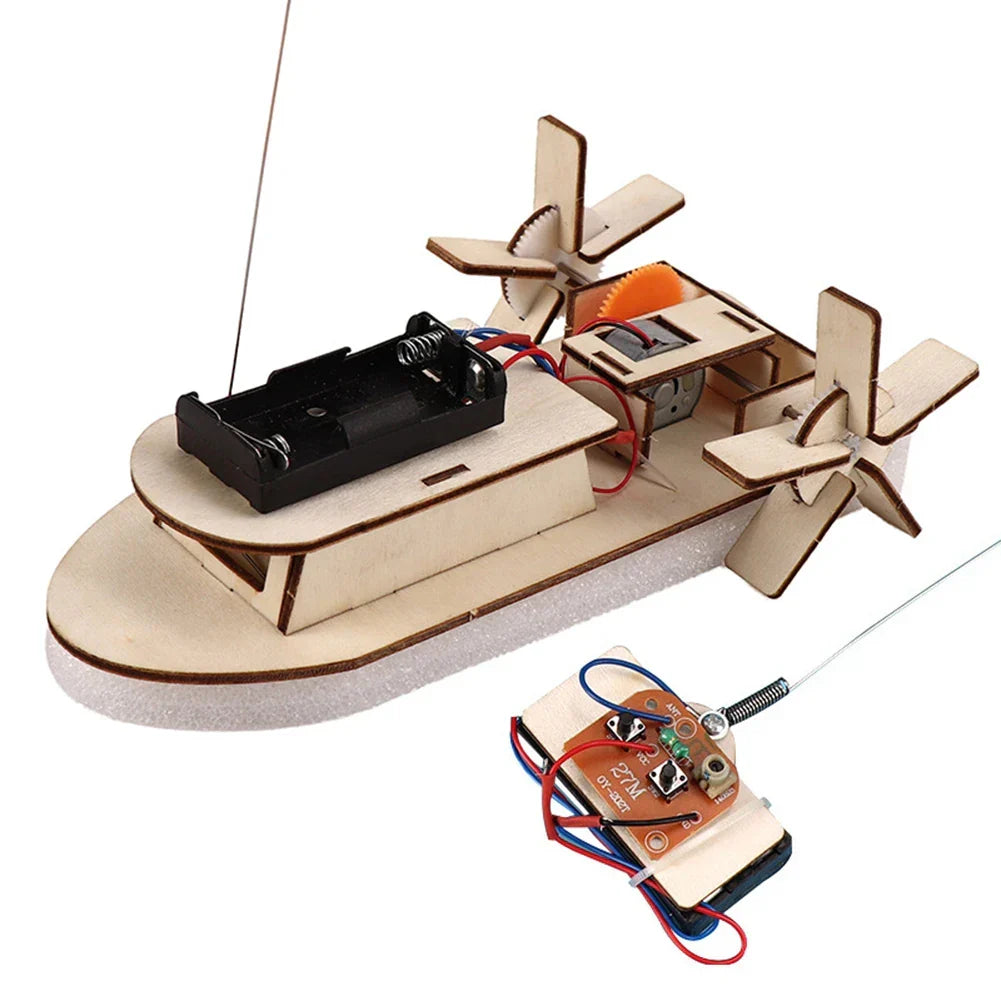 Ready-to-float wooden electric toy boat for water play, assembled from a STEM DIY kit.
