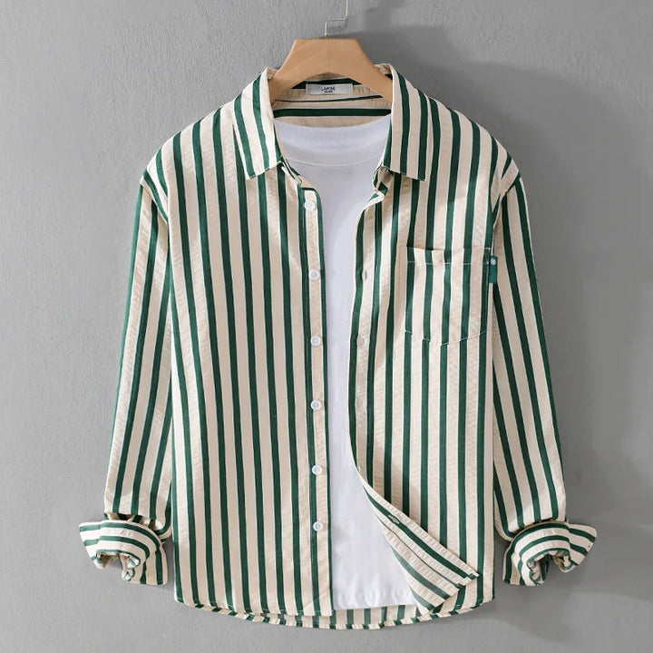 Close-up of a men's striped long sleeve shirt, featuring a button-front and classic pattern for casual style.