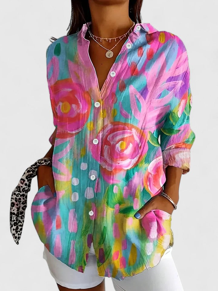 Sophisticated women's floral print blouse, ideal for elegant spring & summer outfits. Effortless style & comfort.