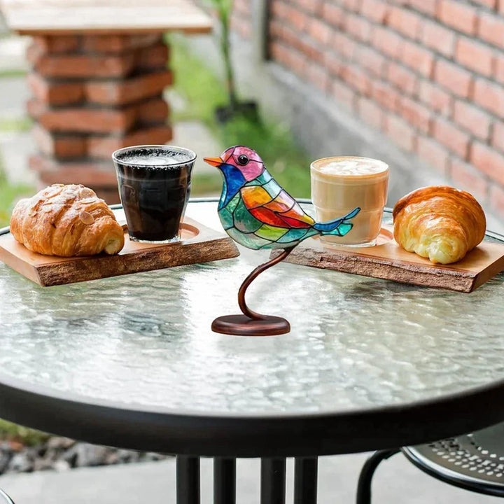 Modern tabletop bird sculpture, elegant coloured glass art, unique decorative home accent.