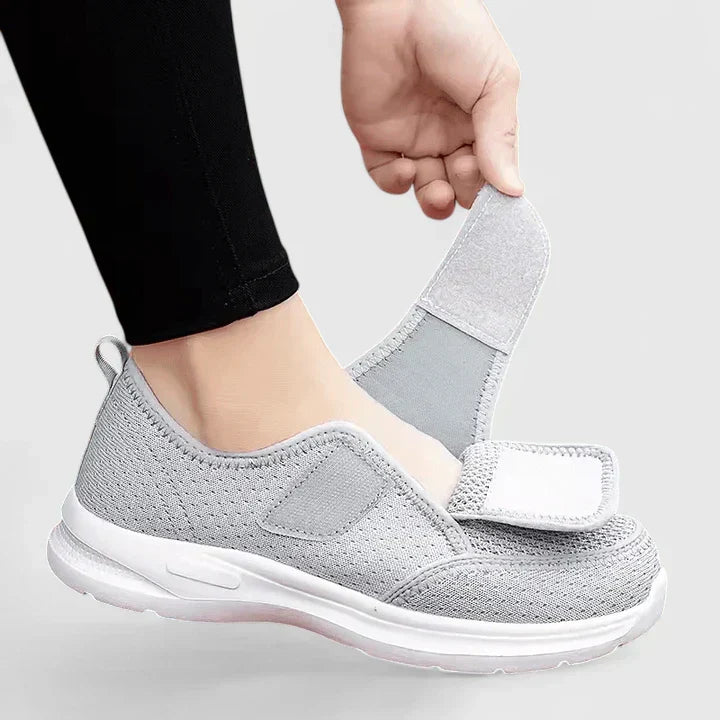 Stylish women's supportive orthopaedic shoes, navy, providing excellent arch support & comfort for daily walks.