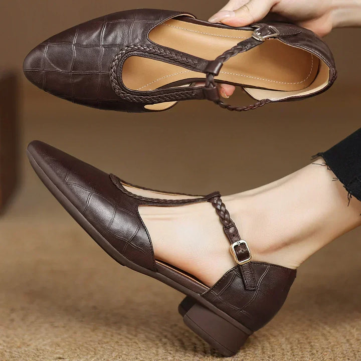 Classic black leather Mary Jane flats for women, vintage style, comfortable low heel everyday shoes.